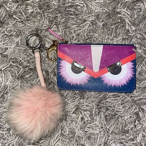 fendi fur ball keychain price|Fendi keychain.